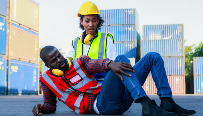 Construction Site Safety Considerations - male and female engineers injured the accident